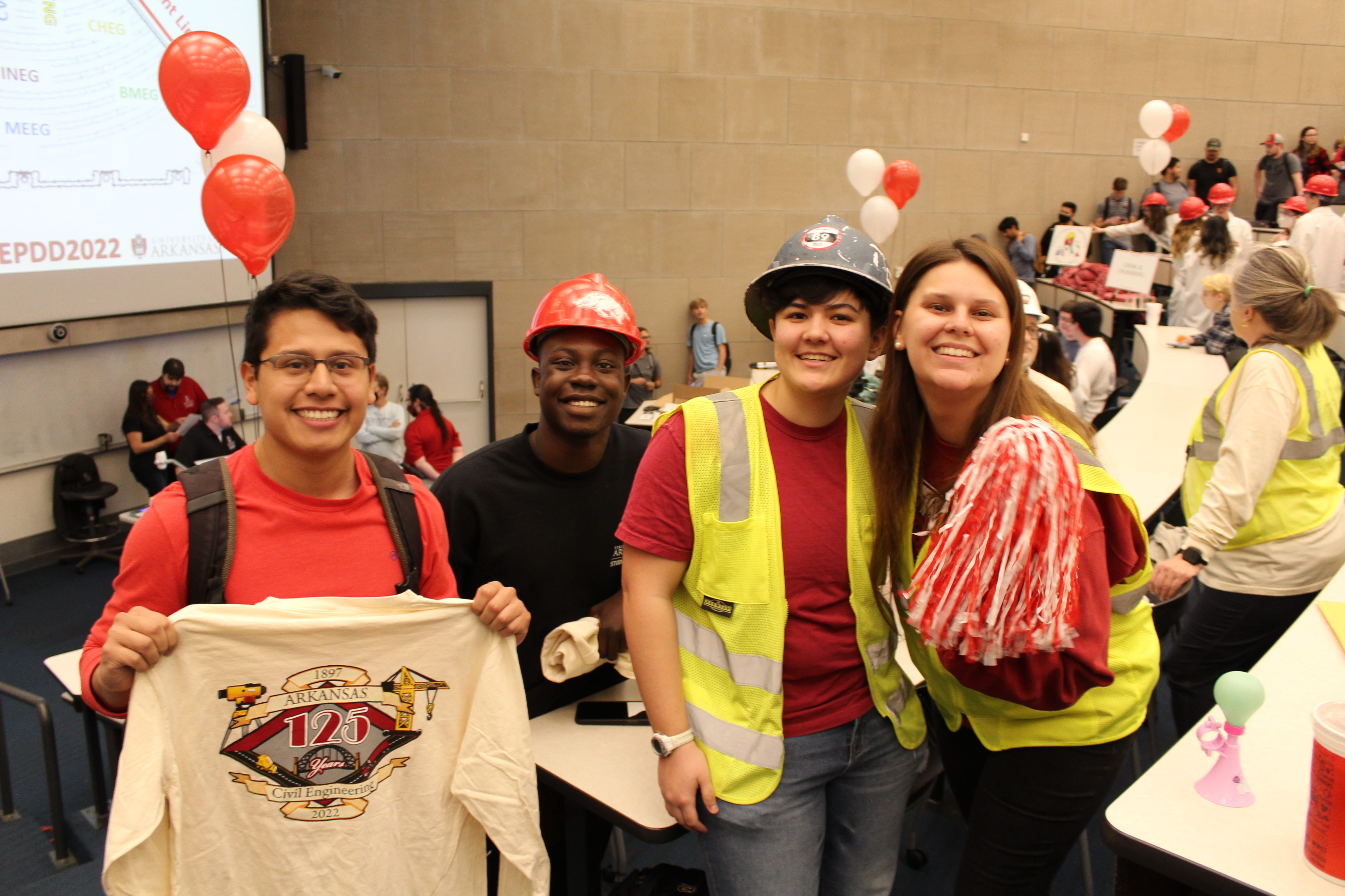 Civil engineering students Anthony Rivas, Victor Awopetu, Sarah Raycher and Bailey Downing pause for a picture during the festivities.