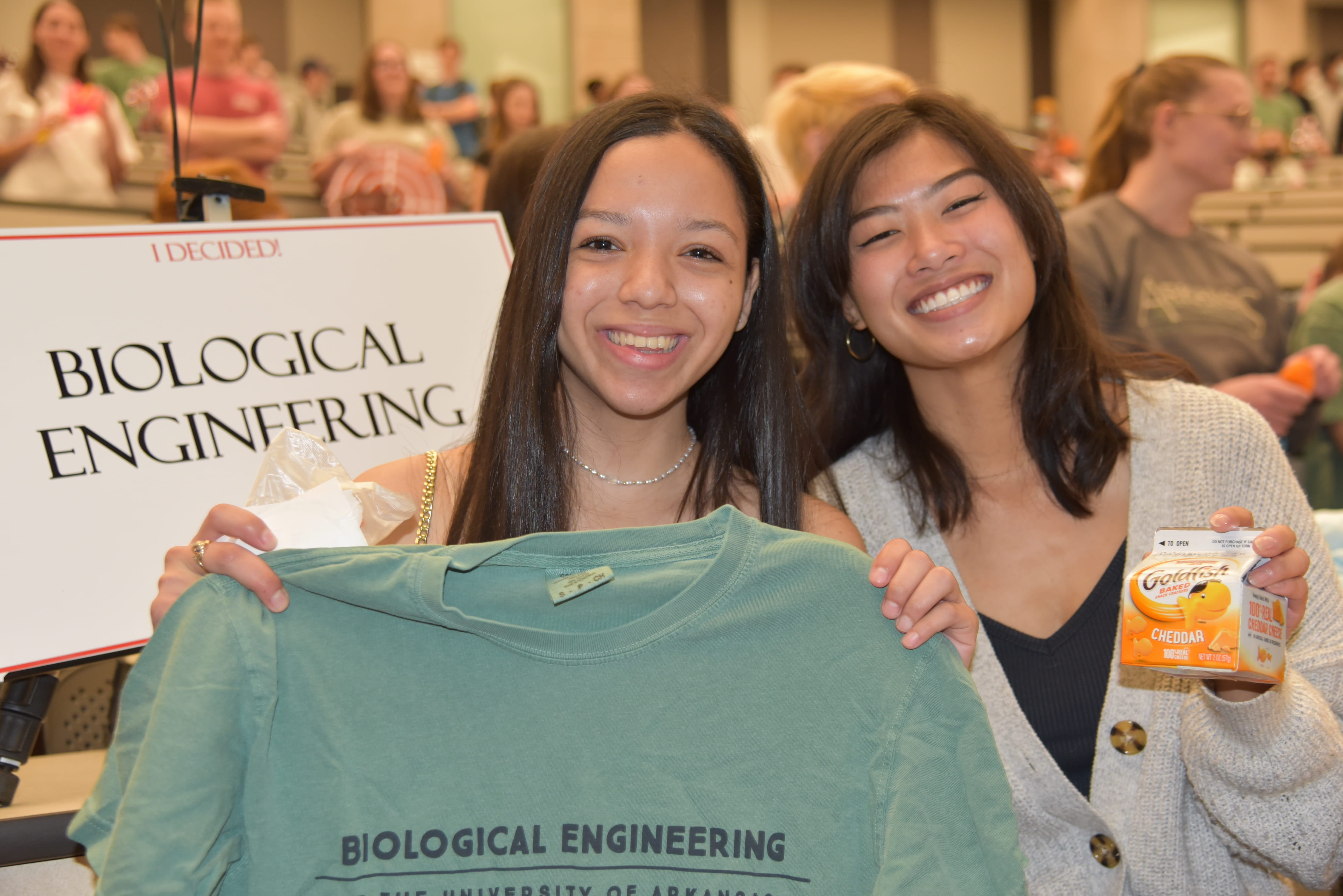 Students Maria De Los Angeles Vergara Murillo and Lillie Bolton stop to celebrate after De Los Angeles declared biological engineering as her major. 