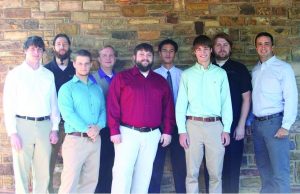 Kyle Rogers poses with U of A graduates and current students who are working at SOAPware. Left to right: Phillip Cannon, Paul Martin, Sawyer Anderson, Adam Higgins, Matthew Burton, Ross Thian, Mason Hollis, Nathaniel Johnson and Kyle Rogers.